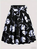 saia midi preta floral